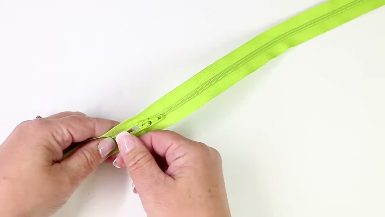 Step 1: Pinch the Open Zipper Teeth Back Together by Hand - How to Sew a Zipper Pouch
