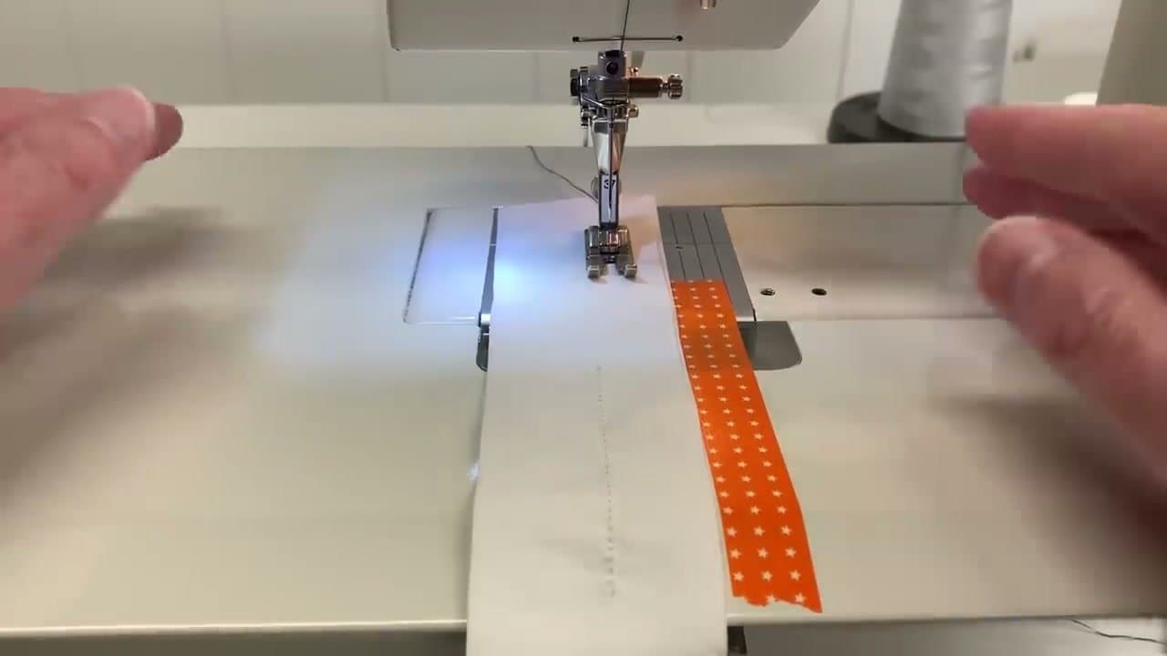 Step 5: Cover Both Feed Dogs - How to Sew in a Straight Line: 7 Beginner Sewing Tips