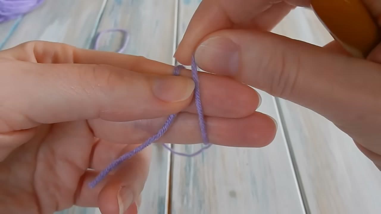Step 3: Step 3: Wrap the Working Yarn Around Two Fingers