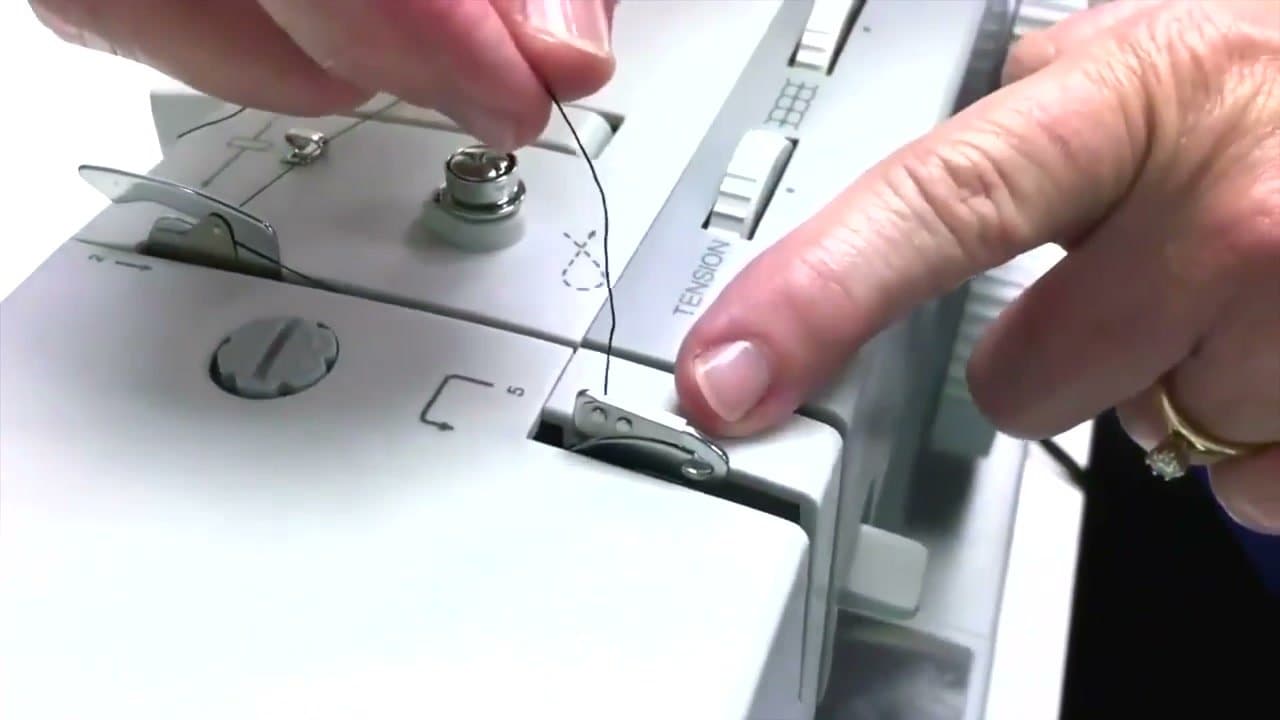 Step 4: Step 4: Hook the thread into the take-up lever