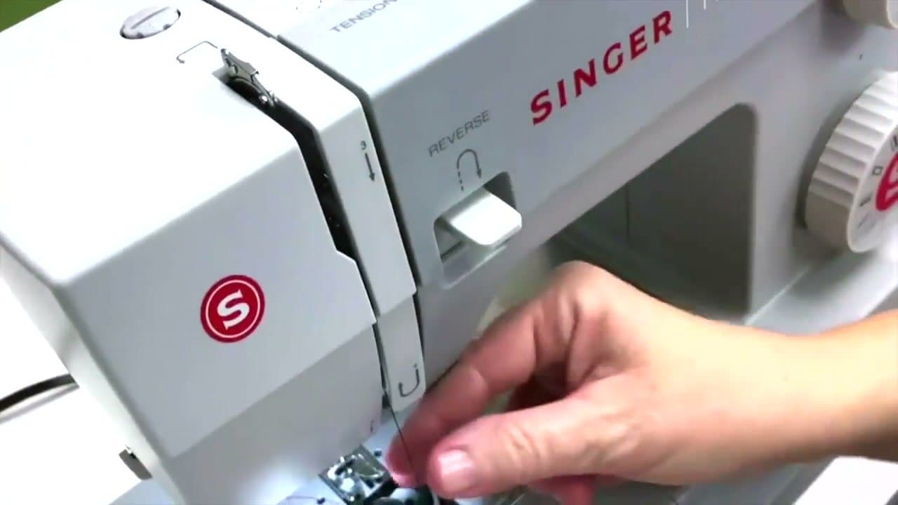 Step 5: Step 5: Guide the thread down to the needle bar