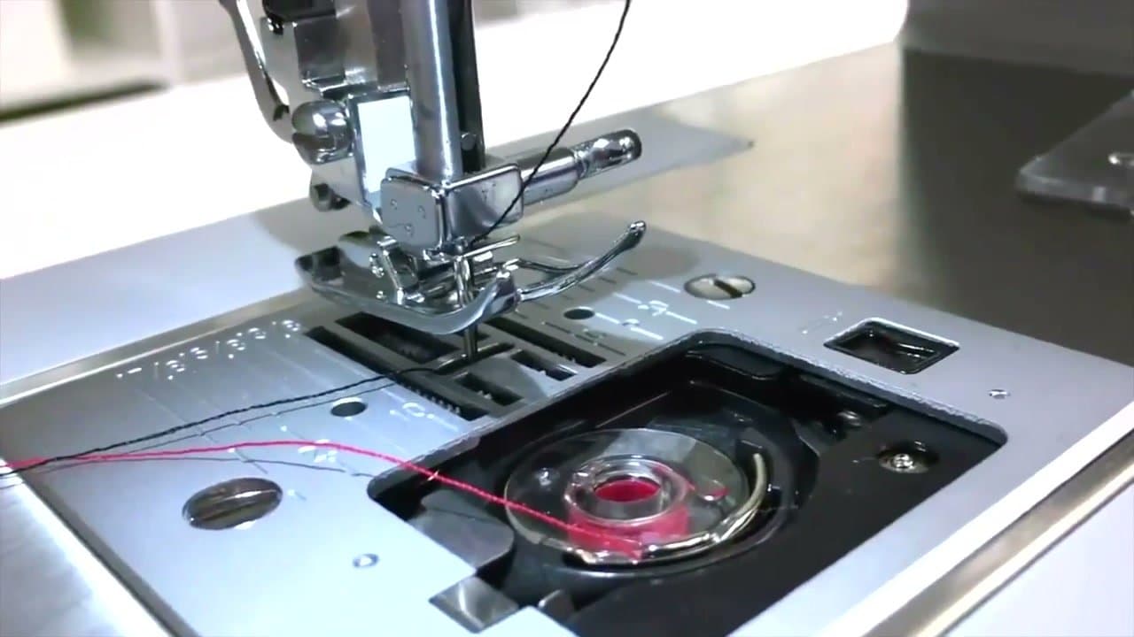 Step 7: Step 7: Bring the bobbin thread up through the plate