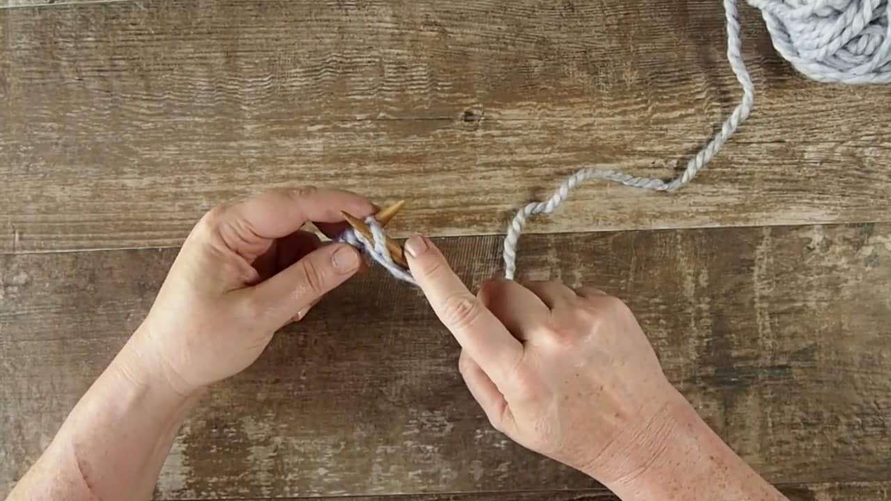 Step 3: Bring the Yarn to the Front Between the Needle Tips - How to Knit Ribbing: 1x1 and 2x2 Rib Stitch