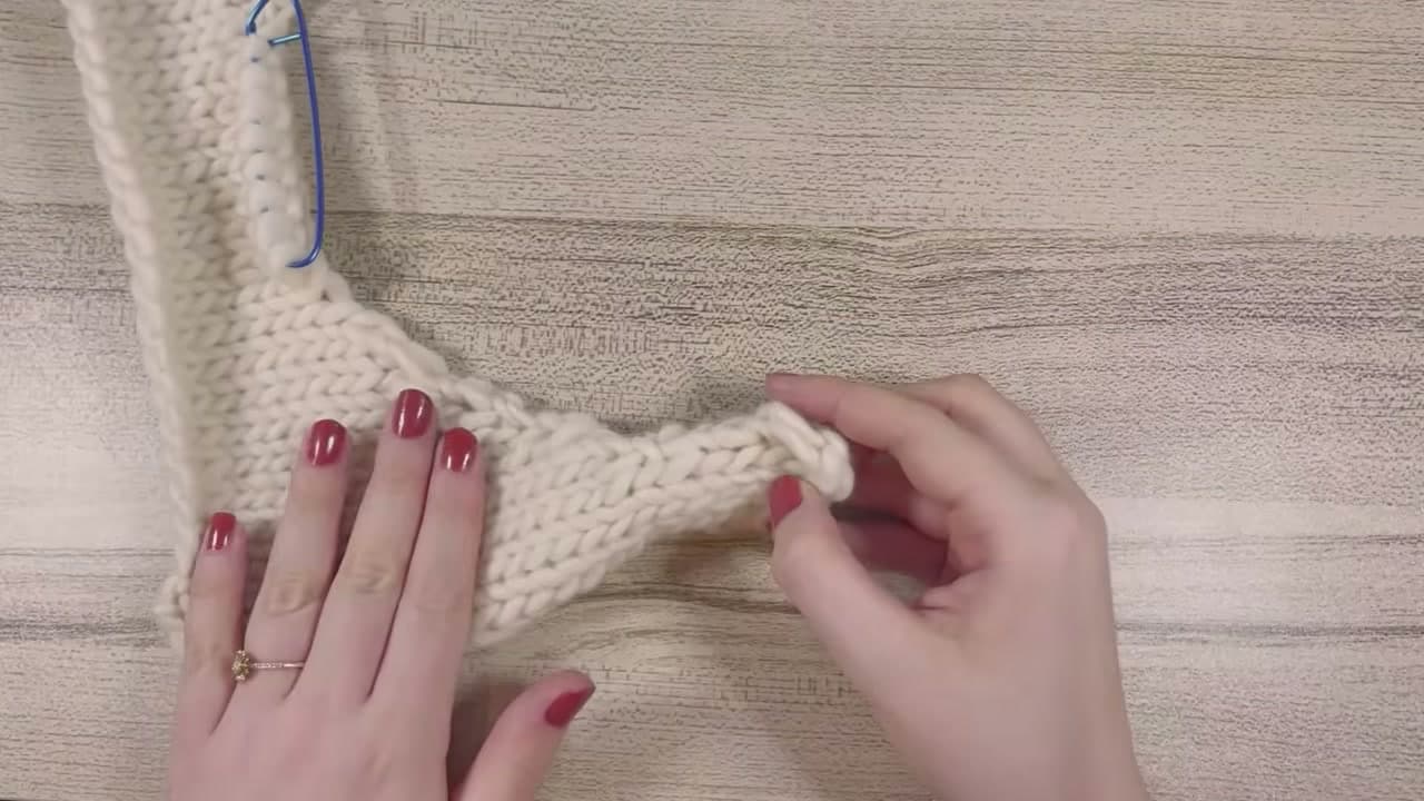 Step 2: Find the Left Shoulder Seam at the Top of the Curved Edge - How to Pick Up Stitches Knitting a Neckband