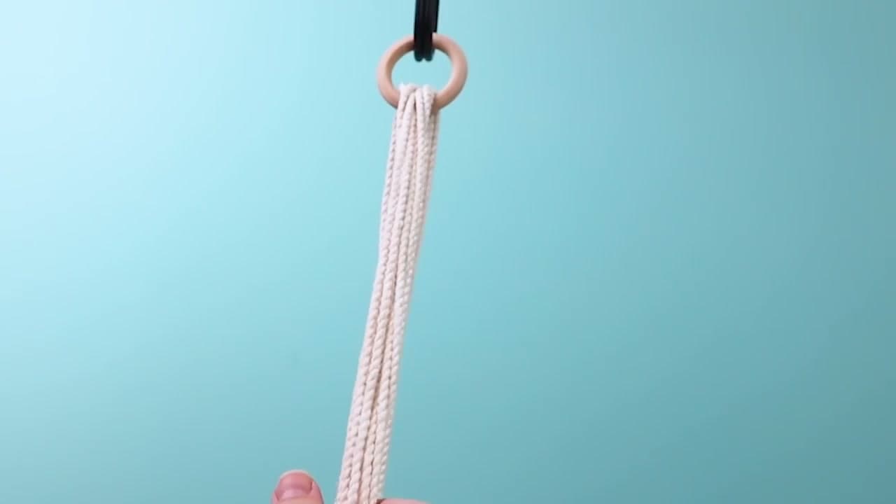 Step 1: Thread Cords Through the Ring - How to Make a Macrame Plant Hanger: 7 Step DIY Tutorial