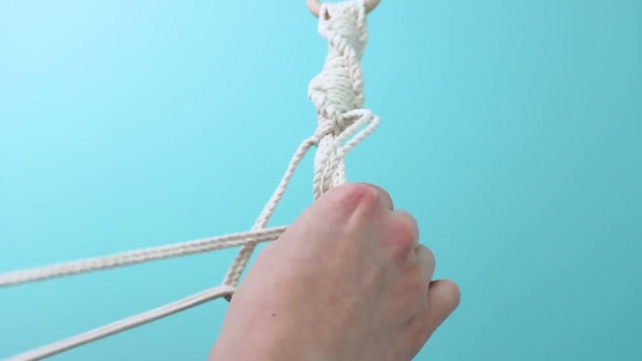 Step 2: Tie 25 Spiral Half Knots - How to Make a Macrame Plant Hanger: 7 Step DIY Tutorial