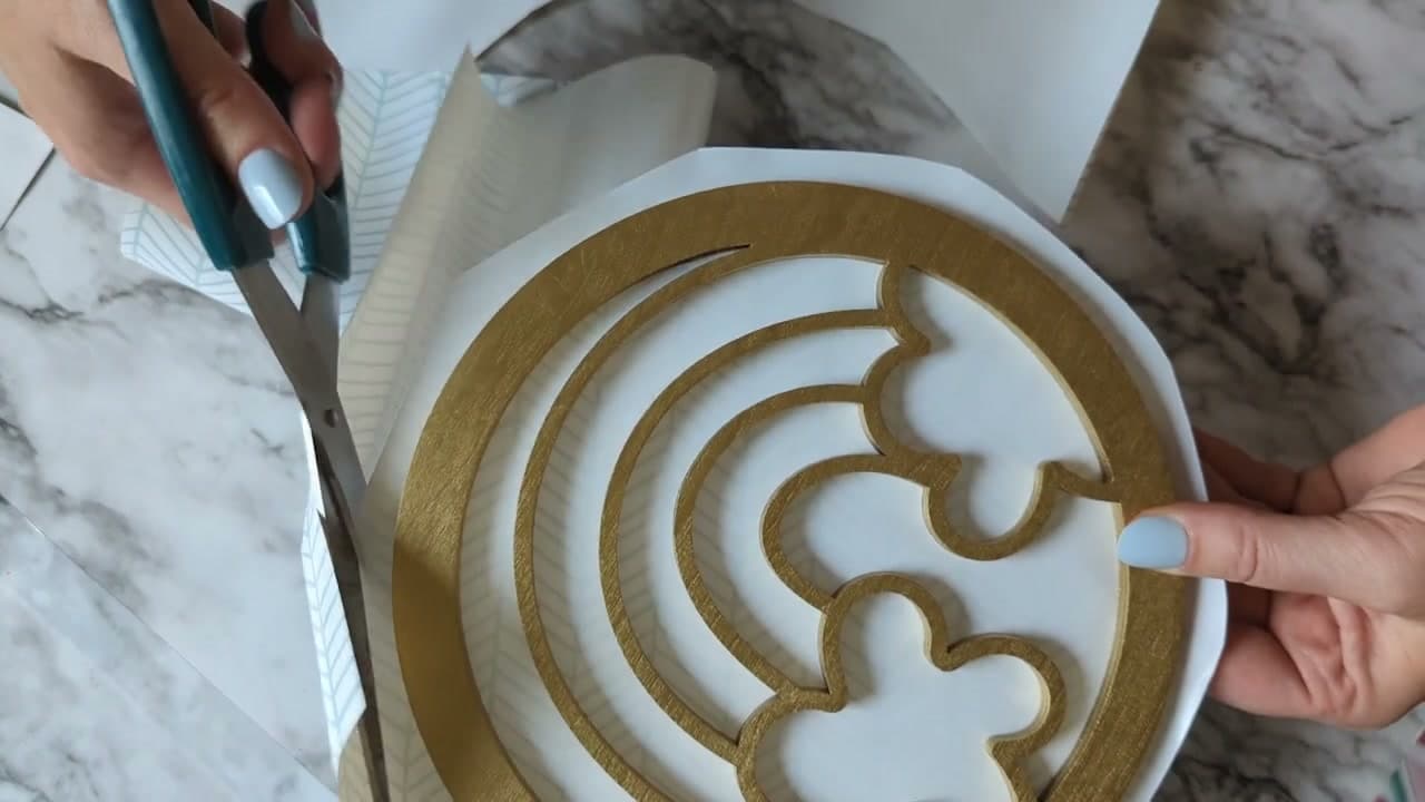Step 2: Press the Blank Onto Contact Paper and Trim the Overhang - How to Make a Resin Suncatcher
