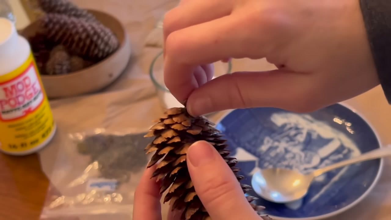 Step 1: Fit the Eye Hook - How to Make Pinecone Christmas Ornaments