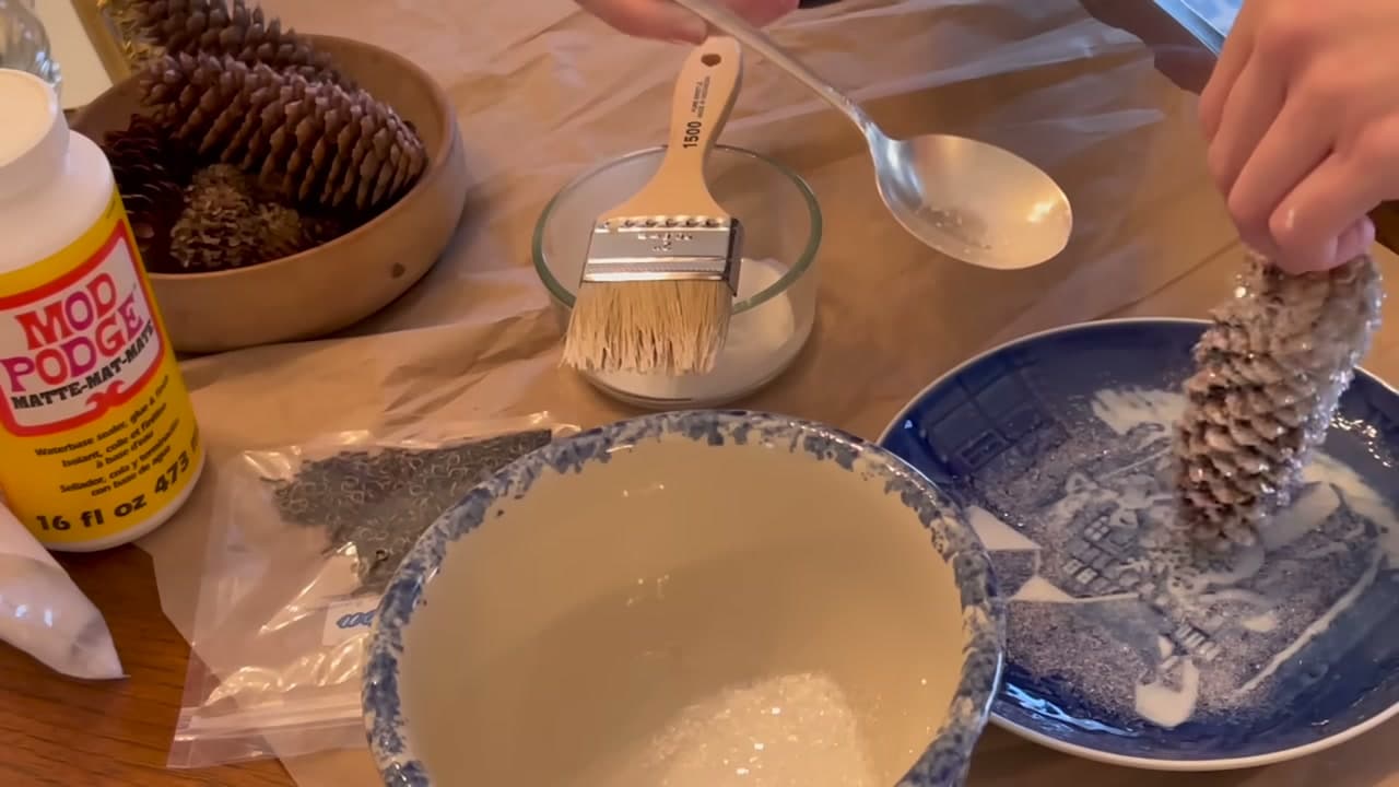 Step 4: Spoon On the Glitter - How to Make Pinecone Christmas Ornaments