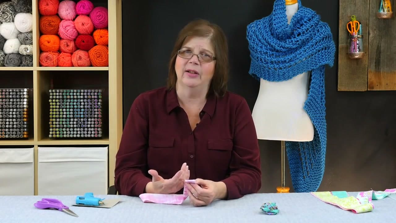 Step 4: Twist the Strip Around the Center - How to Make a No Sew Fabric Flower (Rolled Rose Technique)