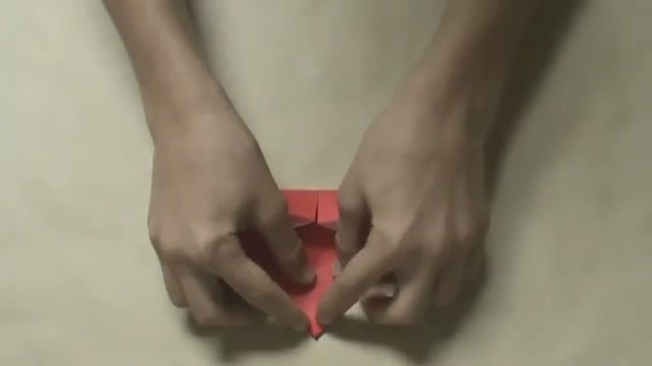 Step 6: Step 6: Pull the Top Tip Down to the Bottom