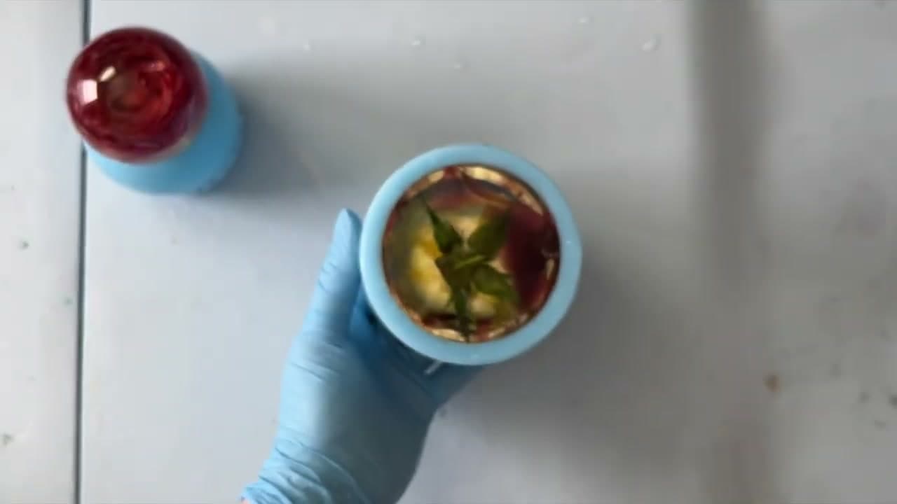 The finished result: How to Seal Flowers in Resin: Preserved Rose Sphere Tutorial